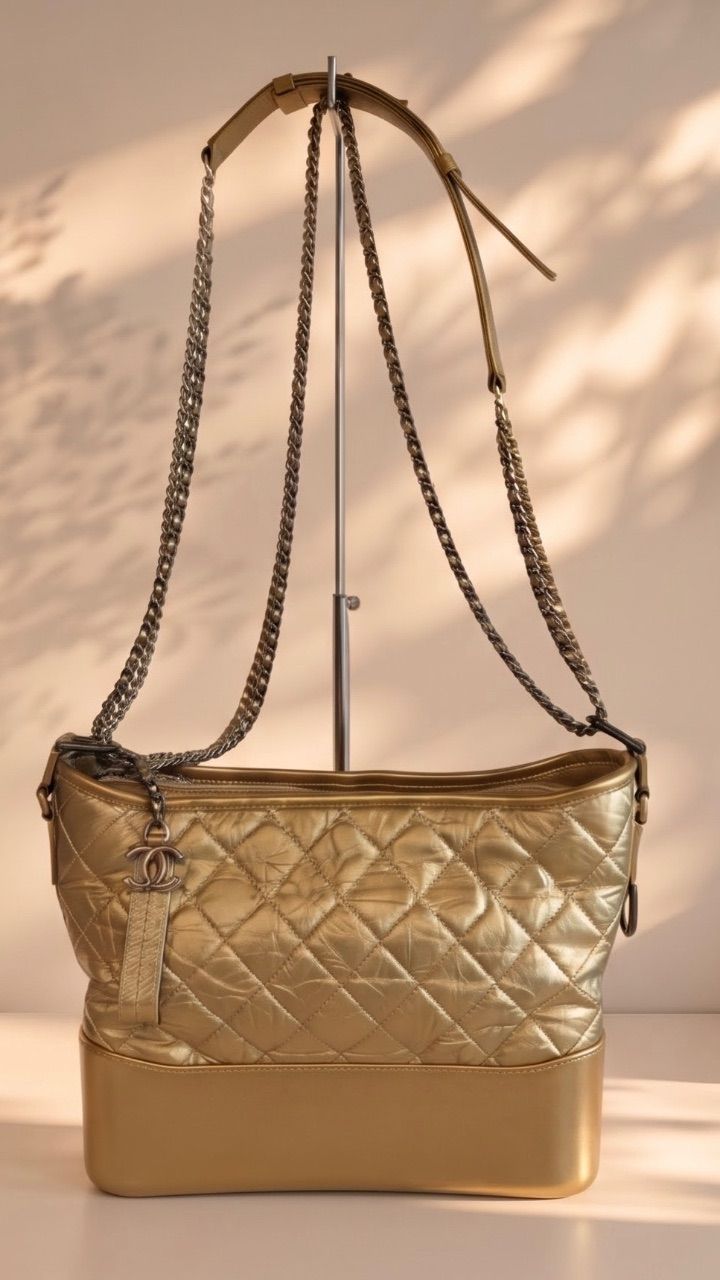 Bolsa Gabrielle dourada — foto 1