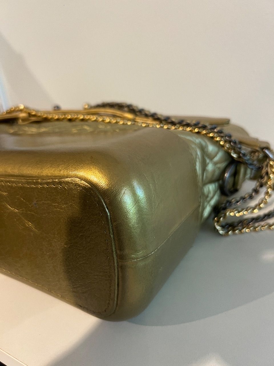 Bolsa Gabrielle dourada — foto 10
