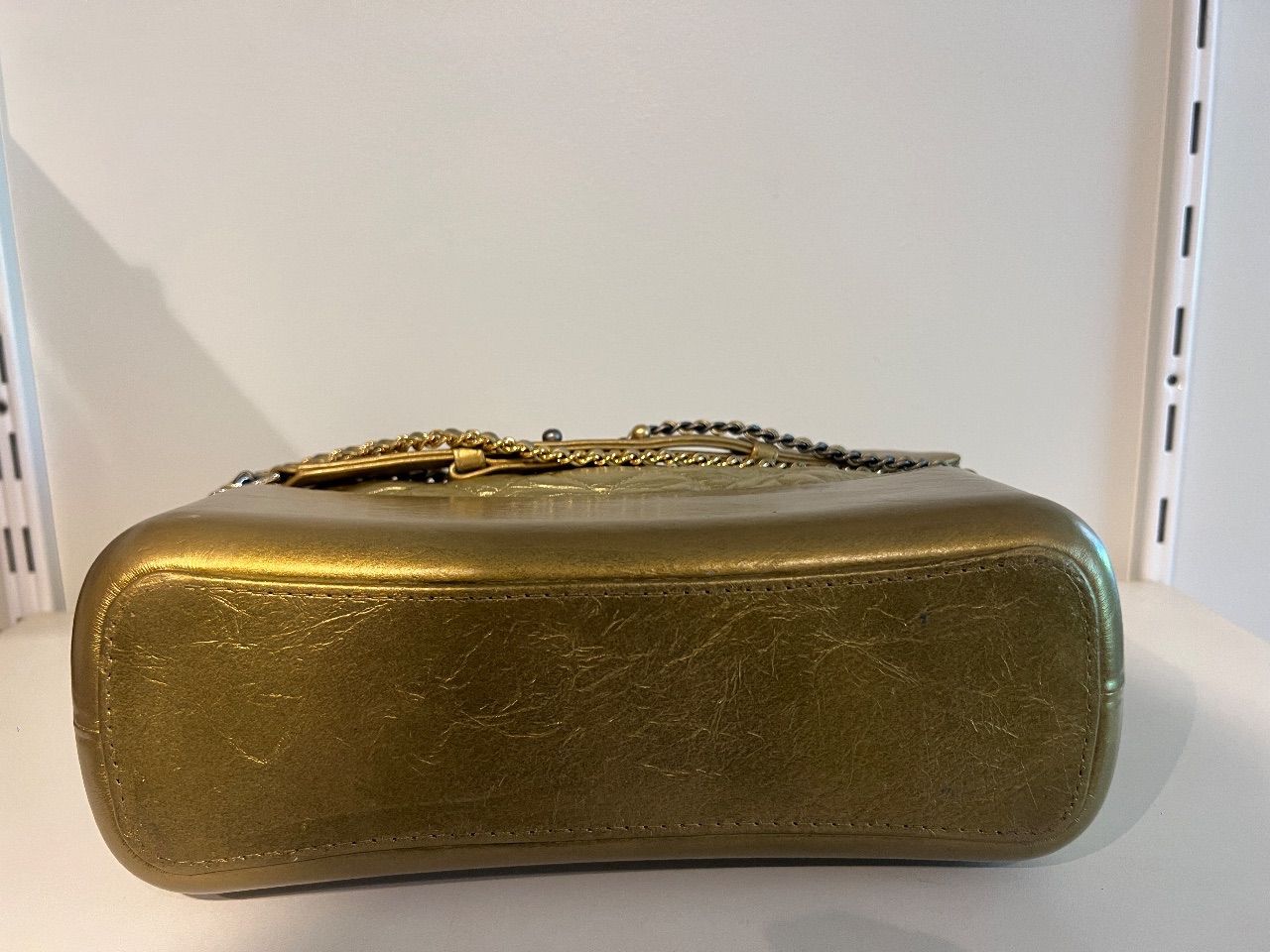 Bolsa Gabrielle dourada — foto 9