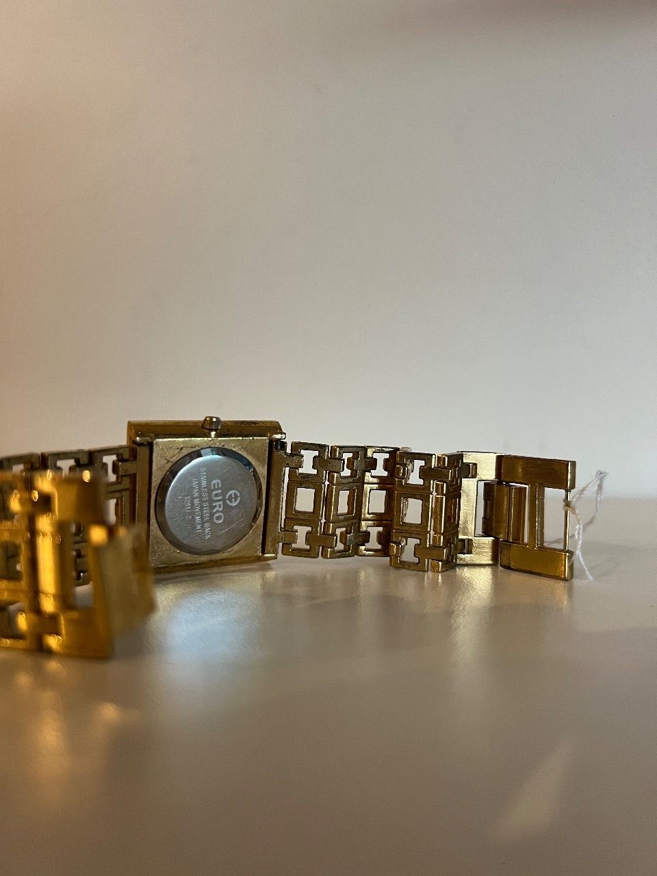 Relógio dourado com caixa — foto 2